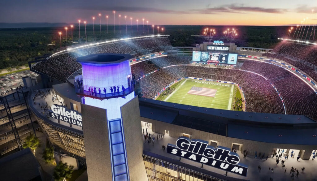Vista externa imponente do Gillette Stadium em Boston, iluminado ao entardecer, com torcedores se aproximando para um grande evento esportivo.